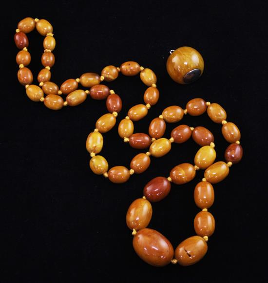 A single strand graduated amber bead necklace,